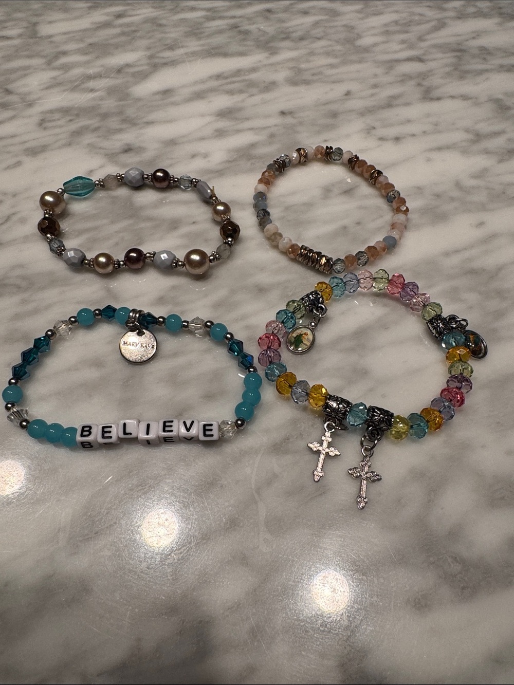 Set of 4 stretch bead/crystal bracelets, incl faith-based & Mary Kay  'BELIEVE'